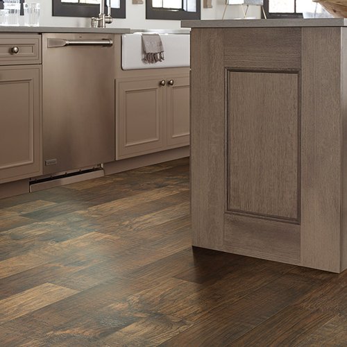 Kitchen cabinets on tile floor from Prestige Flooring Center in Cathedral City, CA