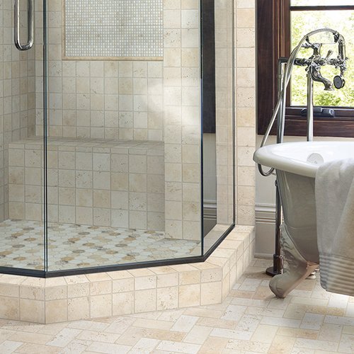 Shower and bathtub on tile floor from Prestige Flooring Center in Cathedral City, CA