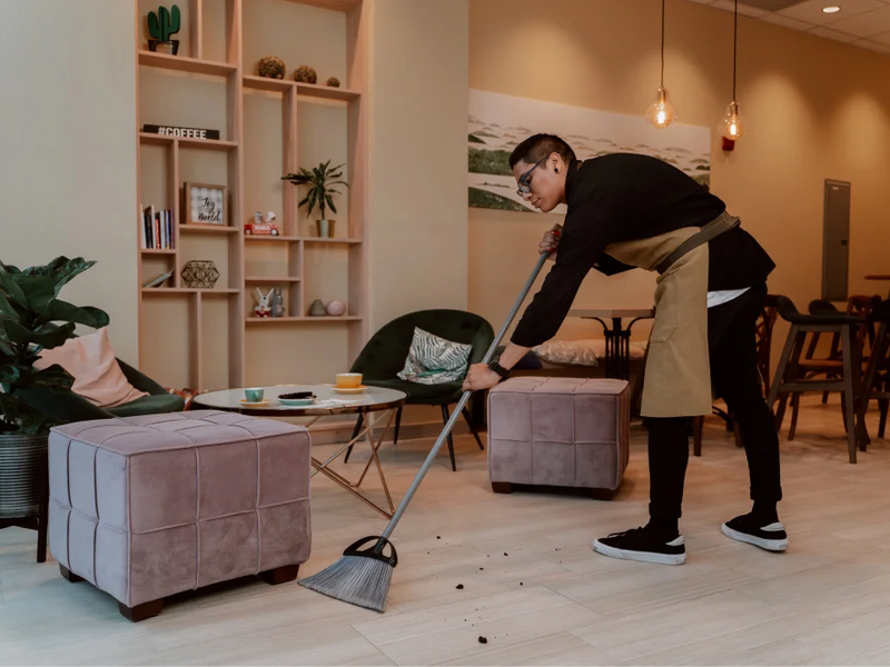 Woman cleaning vinyl flooring